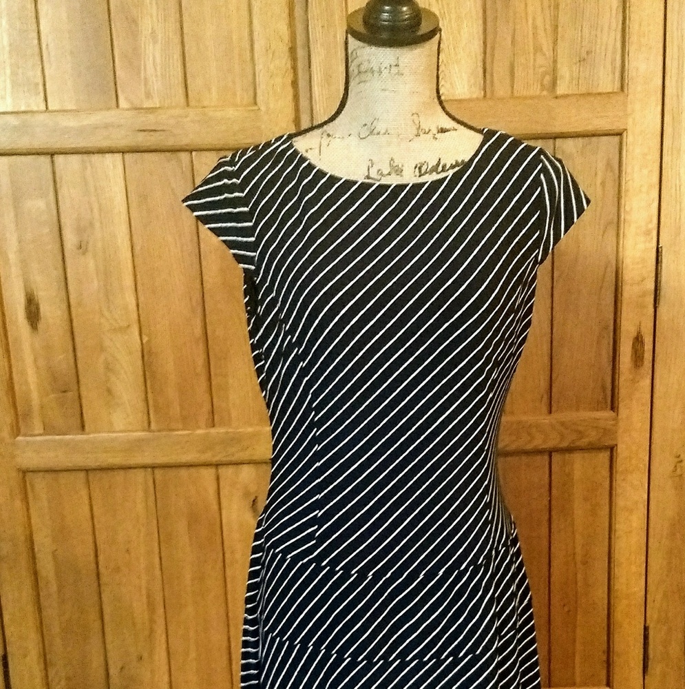 Black and white knee length dress.